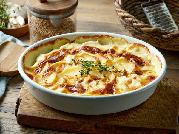 Come ottenere un gratin di frutti di mare con salsa cremosa?